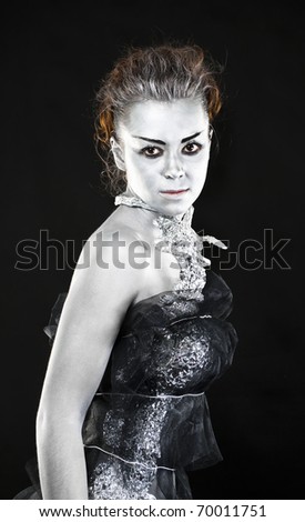 frozen silver woman in black dress look in chamber