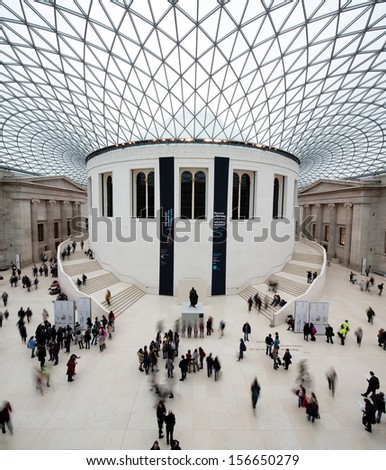 LONDON - MARCH 7: Unique image of people visiting the main court of the British Museum - museum of human history and culture and one of the top attractions of London. London, UK, March 7, 2013.