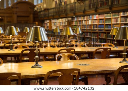 NEW YORK, USA - MARCH 14: Detailed light on table in the historical Rose Main Reading Room in New York Public Library NYPL , on March 14, 2014 in New York, USA.