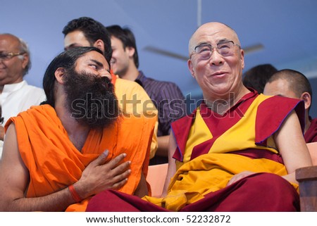 HARIDWAR, INDIA - APRIL 3: Swami Baba (L) Ramdev and Dalai Lama at an event during Kumbh Mela festival April 3, 2010 in Haridwar, India.