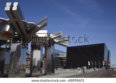 COPENHAGEN, DENMARK - APRIL 24: The Royal Library\'s sculpture at Copenhagen Harbor on April 24, 2010. The Black building is the new extension of the old library, nicknamed \
