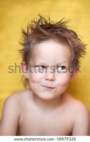 Funny boy with crazy hairstyle