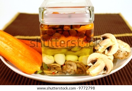 Conserved or pickled vegetables and olives with mushrooms and carrot