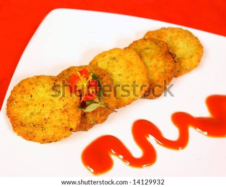 Rice and chickpea cakes with ketchup