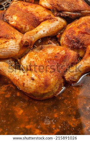 Fried chicken legs in deep fat. Selective focus.