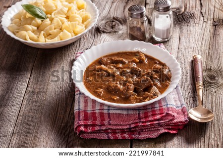 Goulash soup with pork and mushrooms.