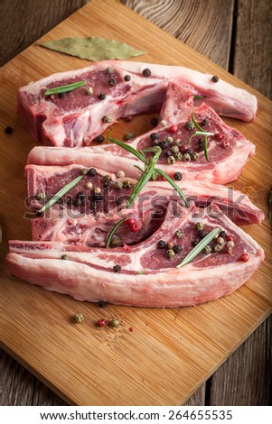 Raw lamb chop ready for frying. Selective focus.