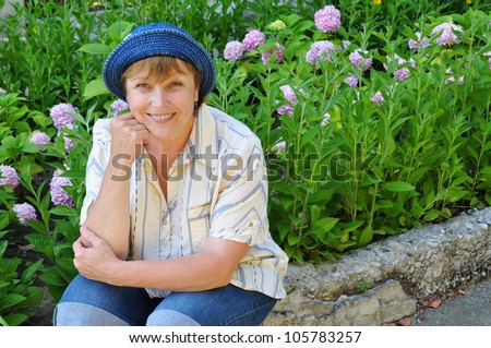 Middle-aged woman working in the garden