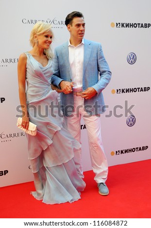 RUSSIA, SOCHI - JUNE 10: Actor Dmitry Dyuzhev with his wife Tatiana at the Open Russian Film Festival 
