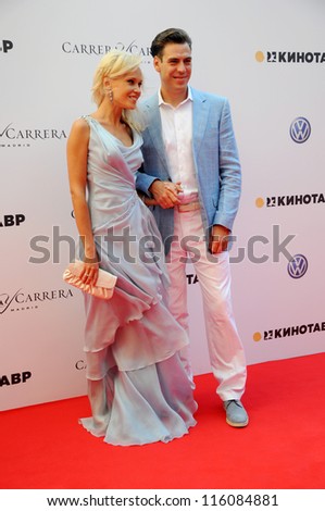 RUSSIA, SOCHI - JUNE 10: Actor Dmitry Dyuzhev with his wife Tatiana at the Open Russian Film Festival \