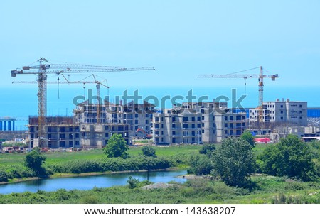 SOCHI, RUSSIA - JUNE 12: Construction of hotels in Main Olympic Village on June 12, 2012 in Sochi, Russia for Winter Olympic Games 2014