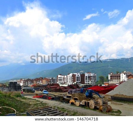 SOCHI, RUSSIA - JULY 10: Construction of new hotels in the Olympic village on July 10, 2013 in Sochi, Russia. Capacity will reach 2,600 people. The Olympic village covers an area of 32 hectares