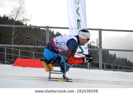 SOCHI, RUSSIA - March 9, 2014: Roman Petushkov (Russia) competes on Winter Paralympic Games  in Sochi. Biathlon, Men's 15 km, sitting