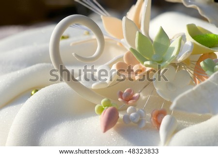 Multicolored flowers for wedding cake