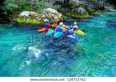 SOCA RIVER, SLOVENIA - JULY 8: White water kayaking on the rapids of river Soca on July 8, 1998 in Triglav national park, Slovenia. Soca is one of the most beautiful rivers of Europe.