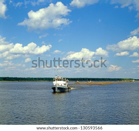 Northern Dvina River, north of Russia, Europe - tugs dragged huge rafts of wood