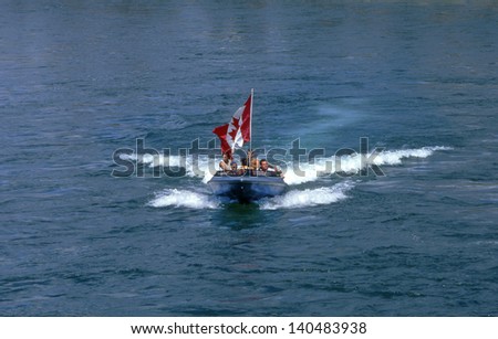 WHITEHORSE, CANADA - JULY 1: People on board celebrating Canada Day on Whitehorse city in Yukon Territory on July 1, 1997