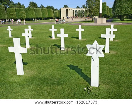 COLLEVILLE-SUR-MER, FRANCE - AUGUST 15: War Graves and Memorial of American cemetery on August 15, 2013 in Collevile, Normandy. On Omaha beach near Collevile vilage was American invastion 1944 year.