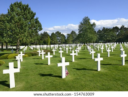 COLLEVILLE-SUR-MER, FRANCE - AUGUST 15: War Graves and Memorial of American cemetery on August 15, 2013 in Collevile, Normandy. On Omaha beach near Collevile vilage was American invasion 1944 year.