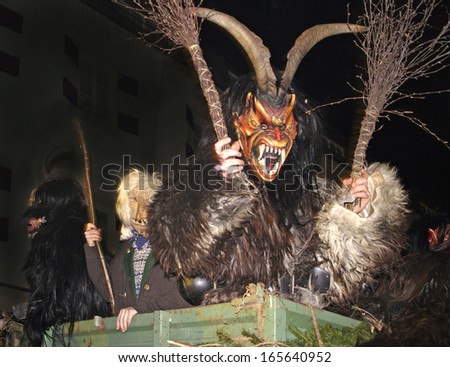 ZELL AM SEE, AUSTRIA - DECEMBER 5: Unidentified men wears Krampus (devil) mask at traditional procession on December 5, 2006 in Zell am See.