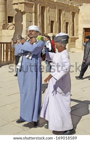 LUXOR, EGYPT - JANUARY 13: Ushers in the temple shows to raise money from tourists of the Hatsepsut Temple on January 13, 2006 in Thebes, Egypt. UNESCO World Heritage Site.