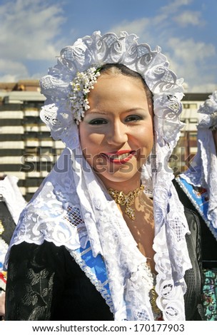 VALENCIA, SPAIN - MARCH 17: Unknown woman, Fallas celebration, one of the biggest parties in Spain where people dresses traditionally, celebration for Saint Joseph on March 17, 2007 in Valencia, Spain