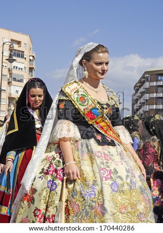 VALENCIA, SPAIN - MARCH 17: Unknown women, Fallas celebration, one of the biggest parties in Spain where people dresses traditionally, celebration for Saint Joseph on March 17, 2007 in Valencia, Spain