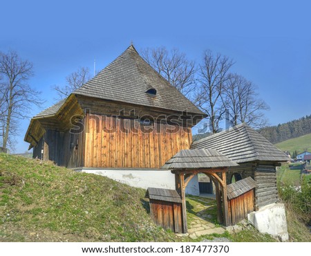 LESTINY, SLOVAKIA - MARCH 29: Wooden church of village Lestiny on March 29, 2014. Articular wooden church dating from 1688-9 and belongs to a set of wooden churches and is UNESCO World Heritage Site