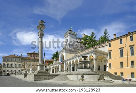 Udine, Square Liberty (La Piazza Liberta) and the clock tower and a column topped by the Lion of Saint Mark. Italy