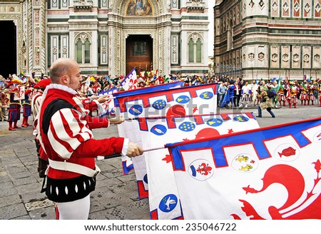 FLORENCE, ITALY - EASTER SUNDAY APRIL 16, 2006: Flag bearers walk in Easter parade wearing historical costumes on April 16, 2006, Florence, Italy. Celebration \