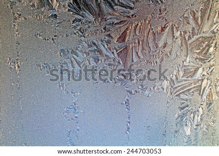 Ice frost on the window - Ice patterns on winter glass, background