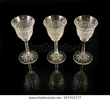 Crystal glass - hand-cut glasses on black background