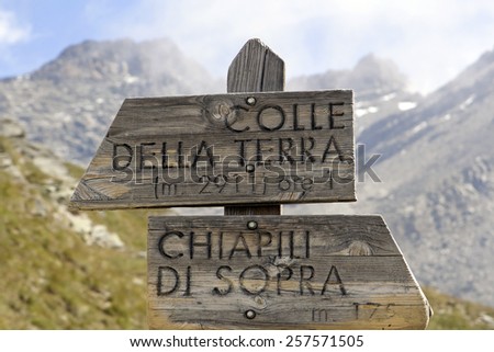 Direction indicator in the mountains. Gran Paradiso National Park in the Alps, Italy