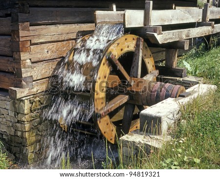 Wooden wheel of an ancient water mill in open-air museum, Skansen at Roznov pod Radhostem, Western Beskids, Czech Republic