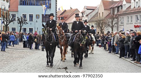 WITTICHENAU, GERMANY - EASTER SUNDAY 4 APRIL: The Easter Riders of Upper Lusatia  announce the news of Jesus resurrection on April 4, 2010, Wittichenau, Germany. This announcement parade happens every year.