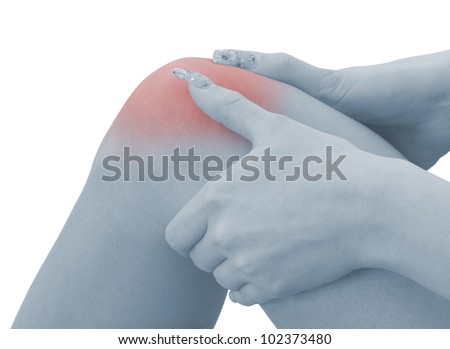 Pain in a woman  knee. Female holding hand to spot of knee-aches. Concept photo with Color Enhanced blue skin with read spot indicating location of the pain. Isolation on a white background.
