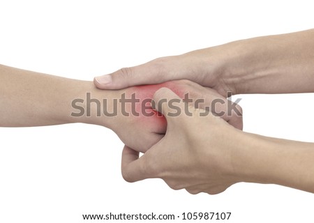 Acute pain in a woman wrist. Female holding hand to spot of wrist pain.