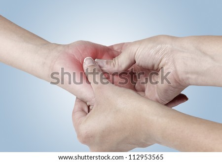 Acute pain in a woman Pain.  Isolation on a white background. Color Manipulation image to emphasize the pain.