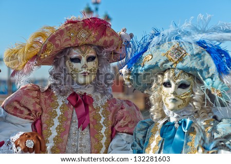 VENICE - FEBRUARY 8: Persons in Venetian costume attend the Carnival of Venice, festival starting two weeks before Ash Wednesday on February 8, 2013 in Venice, Italy.
