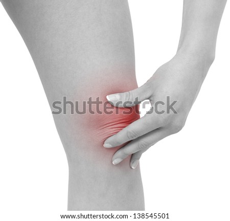 Acute pain in a woman knee. Concept photo with blue skin with read spot indicating pain. Isolation on a white background
