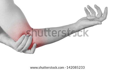 Acute pain in a man elbow. Male holding hand to spot of elbow pain.