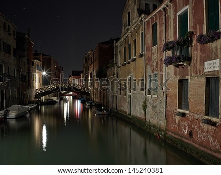 The Light of Venice Long exposure By Night. Blurred motion on curtain due to wind.