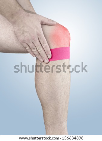 Physiotherapy treatment with therapeutic tape for knee pain, aches and tension. It  is also used for prevention and treatment in competitive sports.