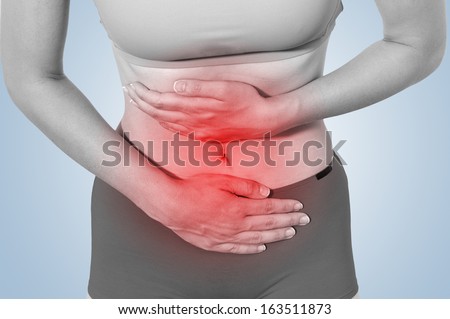 Acute pain in a woman stomach,  Isolation on a white background