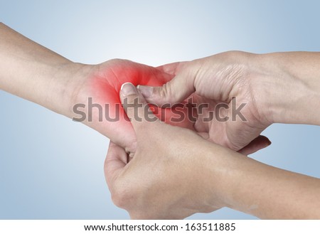 Acute pain in a woman Pain.  On light blue background. Color Manipulation image to emphasize the pain.