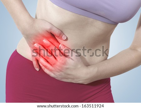 Acute pain in a woman belly. Isolation on a white background