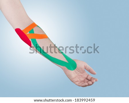 Physiotherapy treatment with therapeutic tape for elbow pain, aches and tension. It is also used for prevention and treatment in competitive sports.
