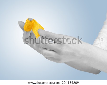 Adhesive Healing plaster on finger. Pain concept photo.