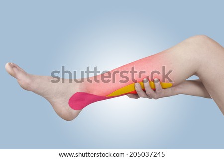 Acute pain in a woman sword. Woman holding hand on spot of sword-aches.