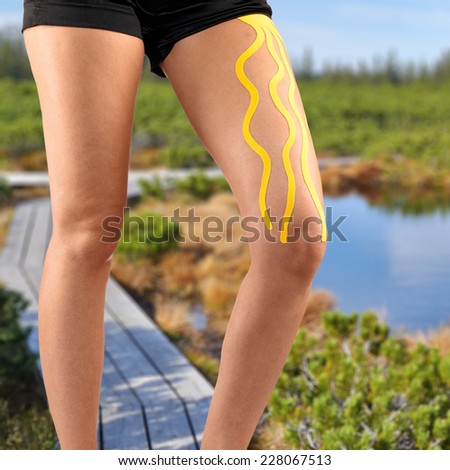 Physiotherapy treatment with therapeutic tape for leg pain, aches and tension. It is also used for prevention and treatment in competitive sports.Autumn Park Backgroun